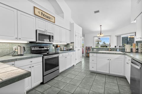 Kitchen with all stainless steel appliances