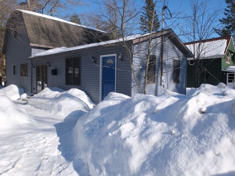 Shot from street of exterior of Robin's Nest in winter