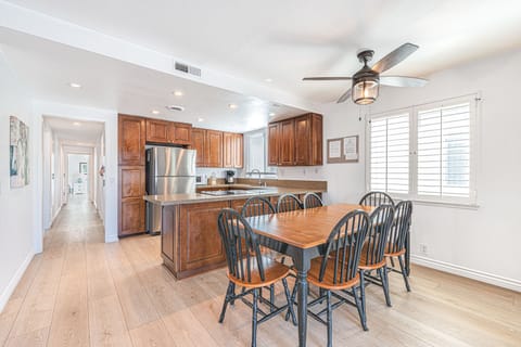 Dining area, adjacent to both kitchen and living areas, is the perfect headquarters for family meals, game night and good conversation.
                