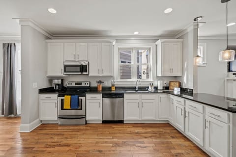 Big well stocked kitchen with plenty of counter space. 