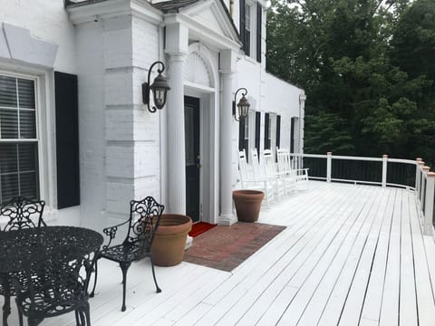 The welcoming porch has places to eat and places to relax
