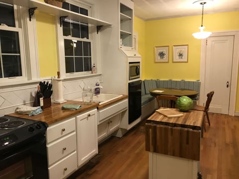 The Kitchen is ADA compliant with a rolling cutting an serving island