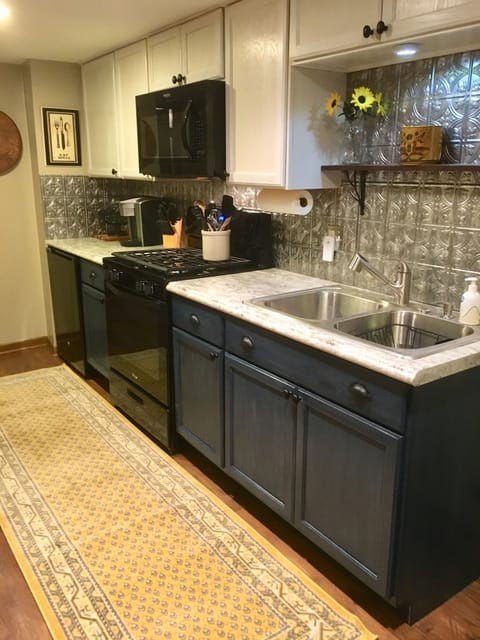 Kitchen with Stove, Oven, Microwave, and Under-Counter Refrigerator