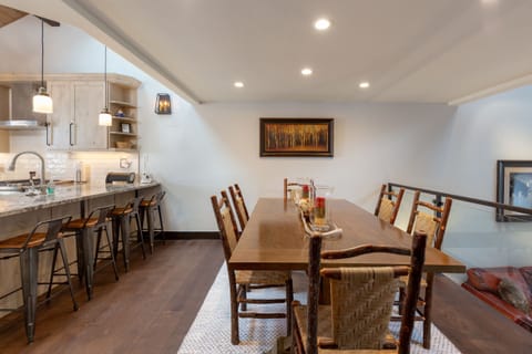 Four more spots just next to the table at the breakfast bar!