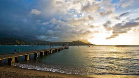 World famous Hanalei Bay & Pier at sunset; just steps away from our home.