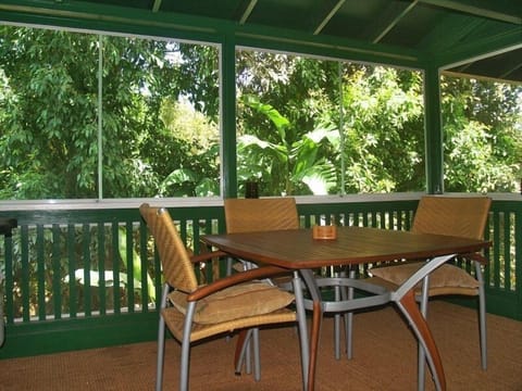 Screened in lounge lanai over the stream