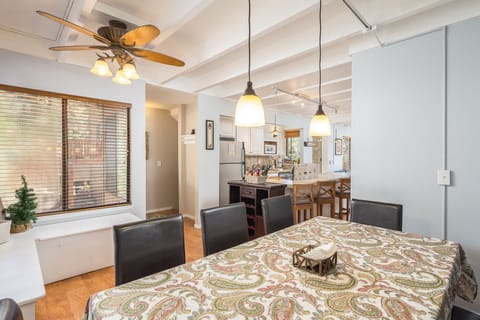Dining area sits 8 + 4 at kitchen bar area