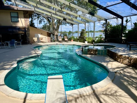 Swimming pool view with lake in background