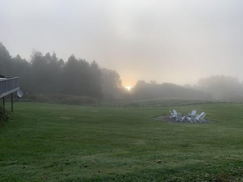 Watch the fall sunrise over the lake while you sip coffee on the deck