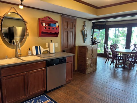 Terrace level kitchen with sink/dishwasher/full size refrigerator/dining area
