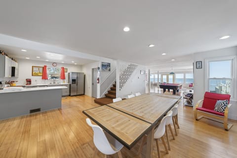 Kitchen at left with Dining Room in foreground.