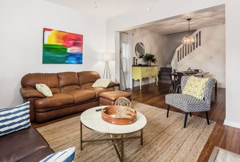 tep back in time while enjoying modern comfort in this beautifully updated 1900 townhome.