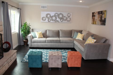 Open space living room with 60' flat screen tv