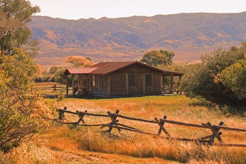 The cabin has great views of Centennial  Ridge and Sheep Mountain. Surrounded...