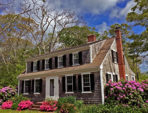 “Twin Oaks” south facing Full Cape Cod style home. Built 1930’s.