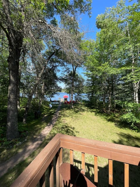 Flat lot for lawn games and smoker for the GUYS to cook! Paver path to lake