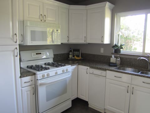 Gas range and large microwave oven