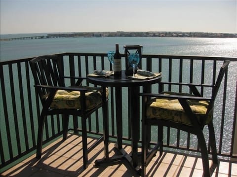 Boca Ciega Bay sparkles as you enjoy a refreshing drink at our  new bistro set