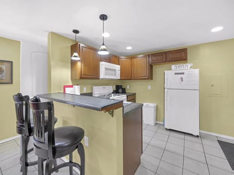 Side A Larger side living area/kitchen with 2 bar seats.