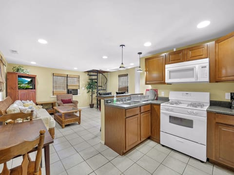 Side A larger side open space kitchen and living room.