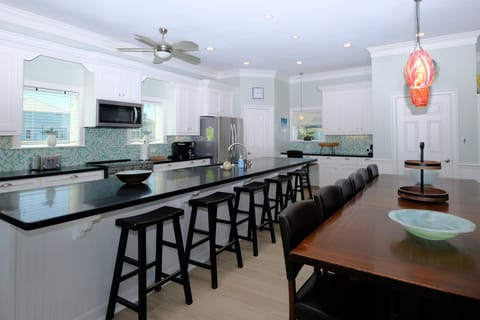 Breakfast bar at the oversized kitchen island.  Perfect for family gatherings.