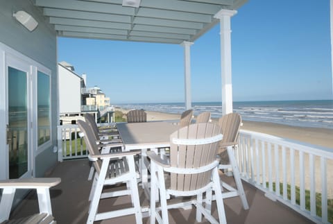 Outdoor covered dining on the main deck  with unobstructed Gulf views!