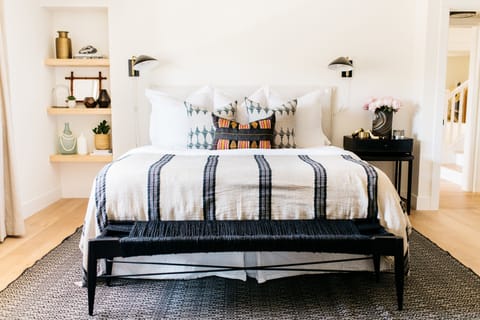 Downstairs master bedroom with king bed, walk in closet and private bathroom