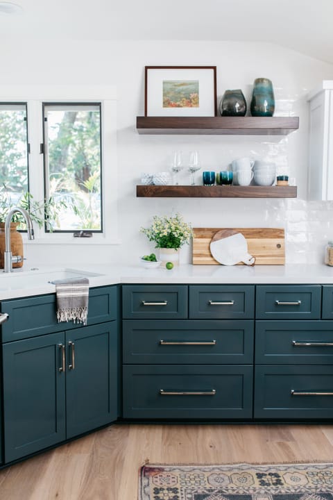 New cabinets with modern hardware and open shelves