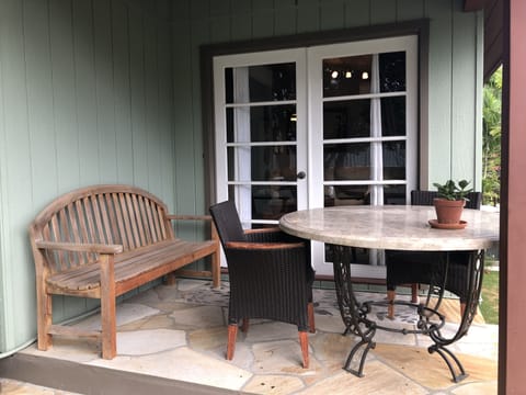 The covered patio is a nice place to relax