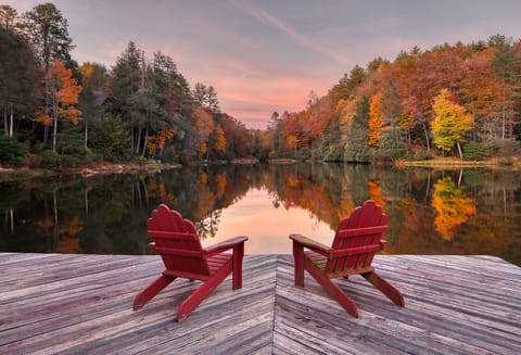 View fr dock on left you can see part of the lodges roof line through the trees.