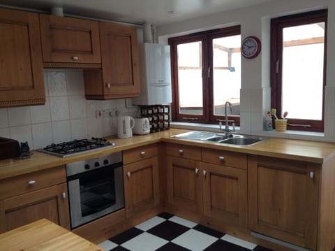 Well appointed kitchen at rear of house