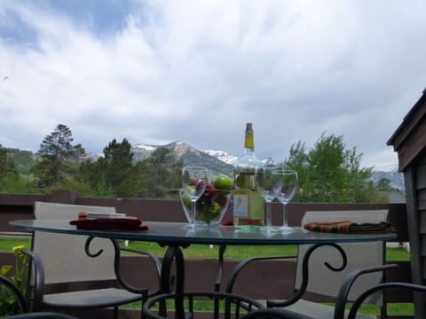 Enjoy glass of wine on our deck, mountain views
