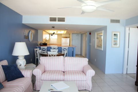 Great room looking into open kitchen and dining area. 
