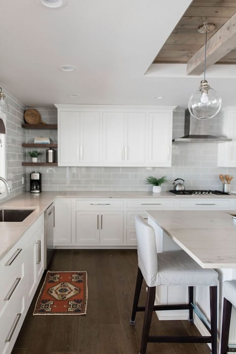 secondary sink with window overlooking the screened porch