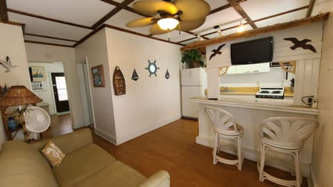 Panoramic view of kitchen and living room from front door