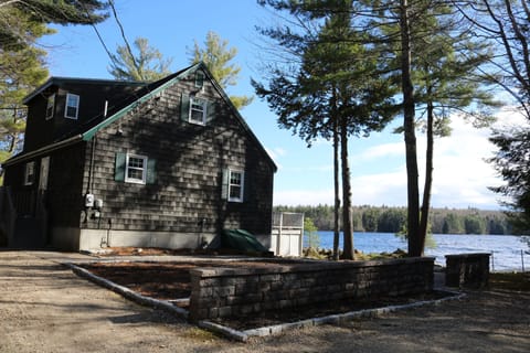 The house sits on its own small peninsula.