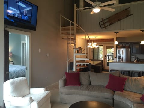 wood floors and staircase is now black also upstairs is enclosed