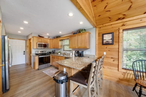 Kitchen bar, door to parking, door to half bath