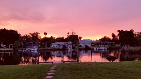 Relax to an amazing sunset over the lagoon from the large screened in lanai