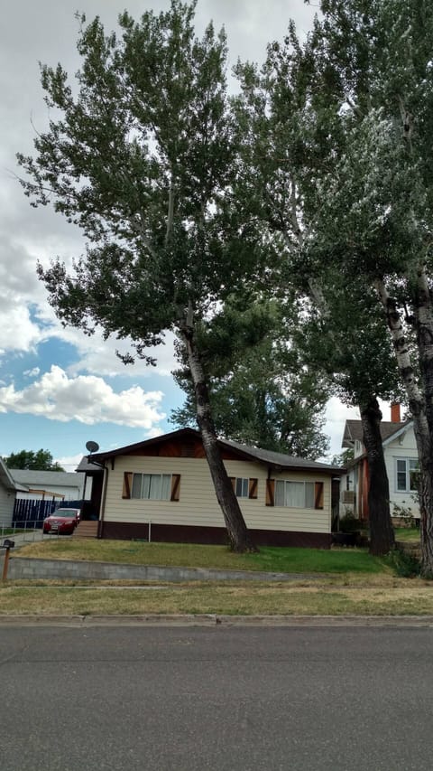 Cozy house is part of a duplex. It is the house located in the back.