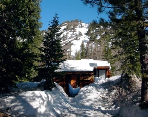 The front of the house in the winter time.