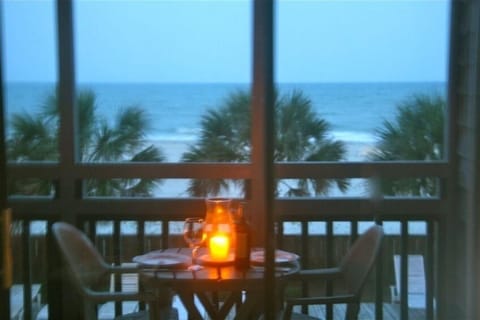 Enjoy the sound of crashing waves as you enjoy dinner on the screened porch.