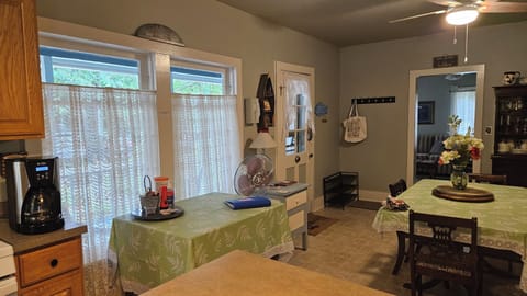 Another view of the kitchen area and front door to/from the porch.
