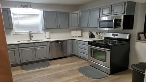 Large kitchen with granite countertops