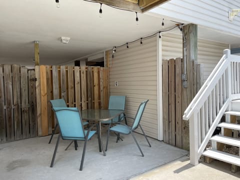 shaded seating area under house