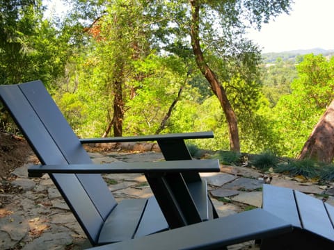 Seating area on the patio up behind the house. Stunning views & deep tranquility