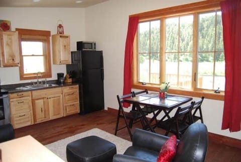 Studio apartment above the garage with private deck & river view.