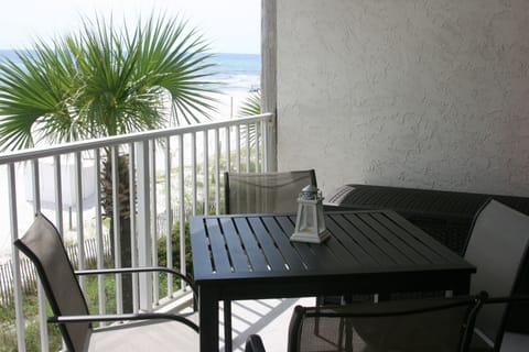 Beachfront balcony breakfast overlooking the ocean