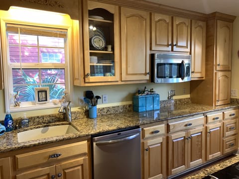 Custom Birch cabinets with granite counters kitchen view