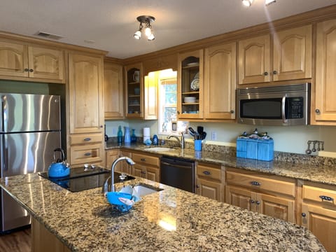 Custom kitchen view with granite island